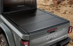Genuine Mopar Tonneau Cover Hard Tri-fold 82216372AD. Fixed Price $1236.25.