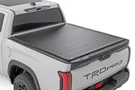 Rough Country Hard Roll Up Bed Cover 5'7" For Toyota Tundra 2022-2025. Fixed Price $749.95.