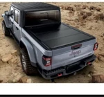 Mopar Jeep Gladiator Tonneau Cover Hard Tri-fold 82216372AB. Fixed Price $1375.00.