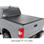 Rough Country Hard Tri-fold Flip Up Bed Cover For 07-21 Toyota Tundra W/ 67". Fixed Price $849.95.