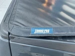 2017 Ford F-150 Pickup Tonnopro Loroll Rollup Tonneau Cover. Fixed Price $424.99.