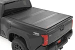 Rough Country Hard Tri-fold Flip Up Bed Cover 6' For Toyota Tacoma 24-25. Fixed Price $849.95.