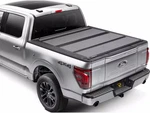 Bakflip MX4 Hard Folding Tonneau Cover For Silverado & Sierra 2500 Hd 6'9". Fixed Price $1099.99.