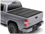 Bakflip MX4 Tri Folding Tonneau Cover For 2007-2021 Toyota Tundra 6'7" Bed. Fixed Price $1249.99.