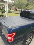 Leer 650112 Quad-folding HF650M Truck Bed Tonneau Cover 15-26 Ford F-150. Fixed Price $1189.00.