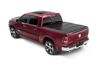 Undercover FX31009 Hard Folding Black Semi-gloss Textured Tonneau. Fixed Price $1049.99.