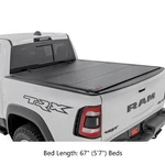 Rough Country Hard Tri-fold Flip Up Truck Cover For Ram 1500 W/ 67" Beds. Fixed Price $849.95.
