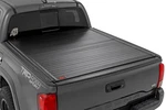Rough Country Hard Roll Up Bed Cover For 16-23 Toyota Tacoma W/5' 50420500. Fixed Price $749.95.