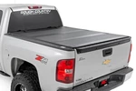Rough Country Hard Tri-fold Flip Up Bed Cover 5'9" Chevy/gmc 1500 (07-13). Fixed Price $849.95.