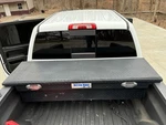 Model 79210919 69IN Saddle Truck Box, Low-profile, Gloss Black. Fixed Price $198.00.