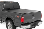 Rough Country 42599650 Soft Roll-up Vinyl Tonneau Cover 99-16 Ford Sd 6.8'. Fixed Price $199.95.