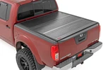 Hard Low Profile Bed Cover 5' Cargo Mgmt Nissan Frontier (05-21). Fixed Price $699.95.